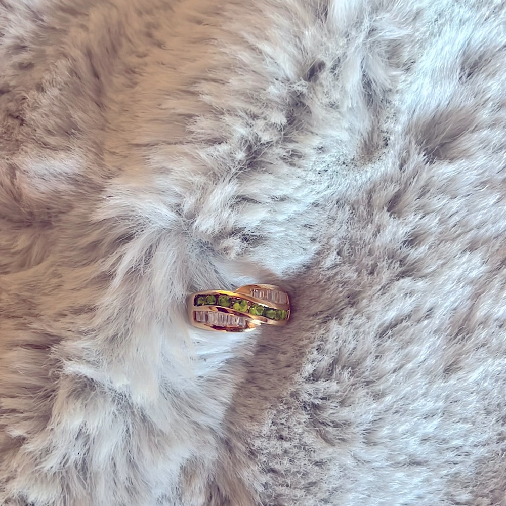 Suzanne Somers Vintage ring. Simulated round peridot stones and clear baguettes.